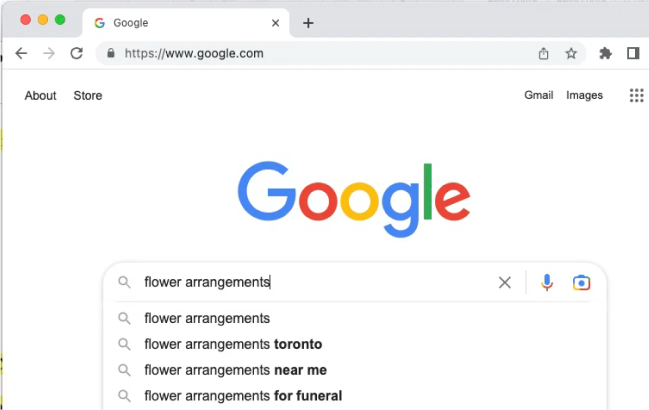 A Google page is open and in the search bar “flower arrangements” is entered. Below the search bar, other variations of the search for flower arrangements are visible.
