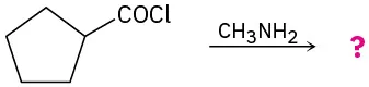 The reaction of cyclopentanecarbonyl chloride with methyl amine to give an unknown product, denoted by a question mark.