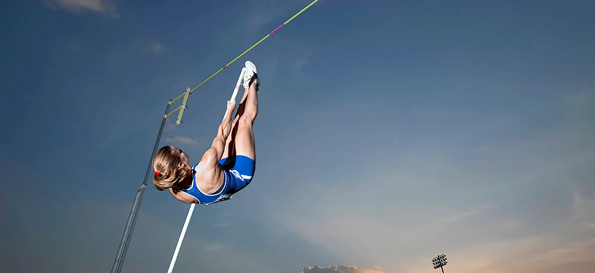  This photo shows a woman working out at a gym.
