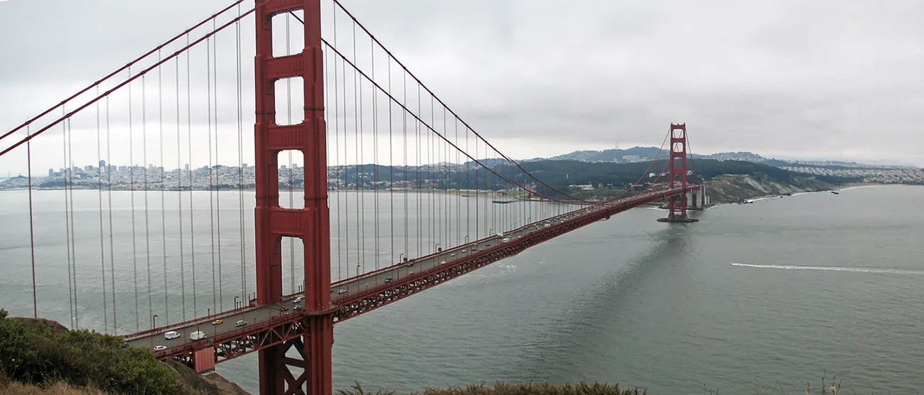 A landscape view of a bridge built over a body of water.