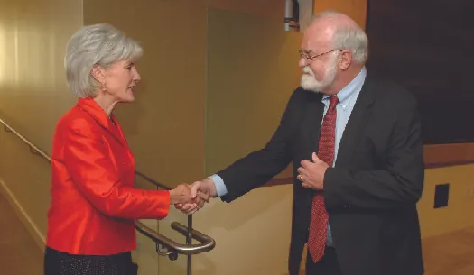 An image of two people shaking hands.