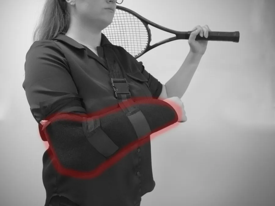 A photograph shows a tennis player’s arm in a sling.