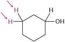 Chemical structure of cyclohexanol. Two arrows point toward the highlighted hydrogens at C 3.