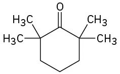The structure of 2,2,6,6 tetramethyl hexanone where two methyl groups are bonded at C 2 and two methyl groups are bonded to C 6 of the cyclohexanone ring.