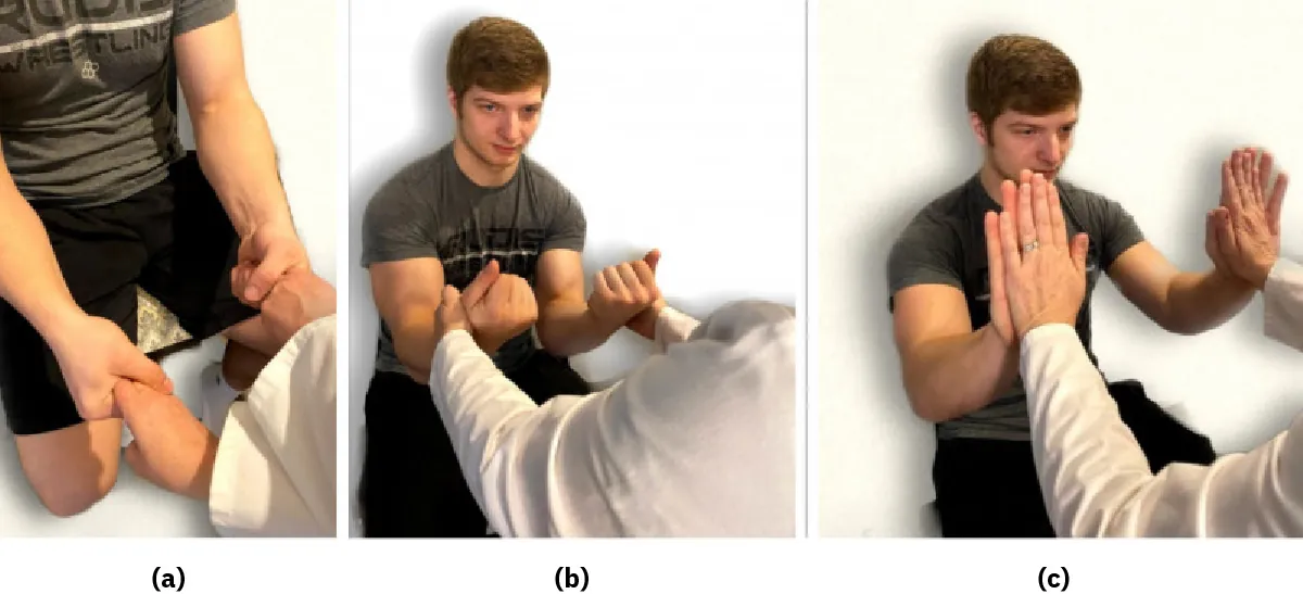 The image is a triptych showing a young man in a gray t-shirt performing three different physical therapy exercises, assisted by a therapist whose face is not visible. The first frame shows wrist manipulation, the second a grip strength test, and the third a resistance exercise with palms pressed together.