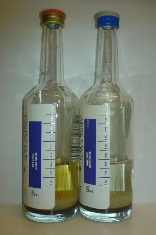 A photo of two blood collection bottles.