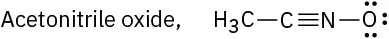 Text reading acetonitrile oxide and a condensed structure of C H 3 C N O, with a triple bond between C and N and three nonbonding pairs on O.