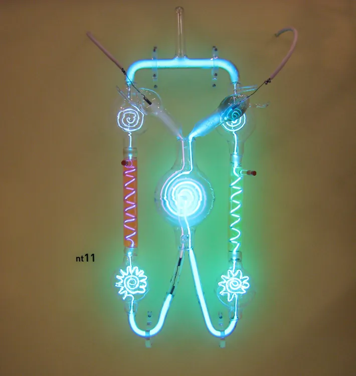 Image of a gas discharge tube consisting of a glass vacuum tube containing two metal electrodes and a low-pressure gas to create light.