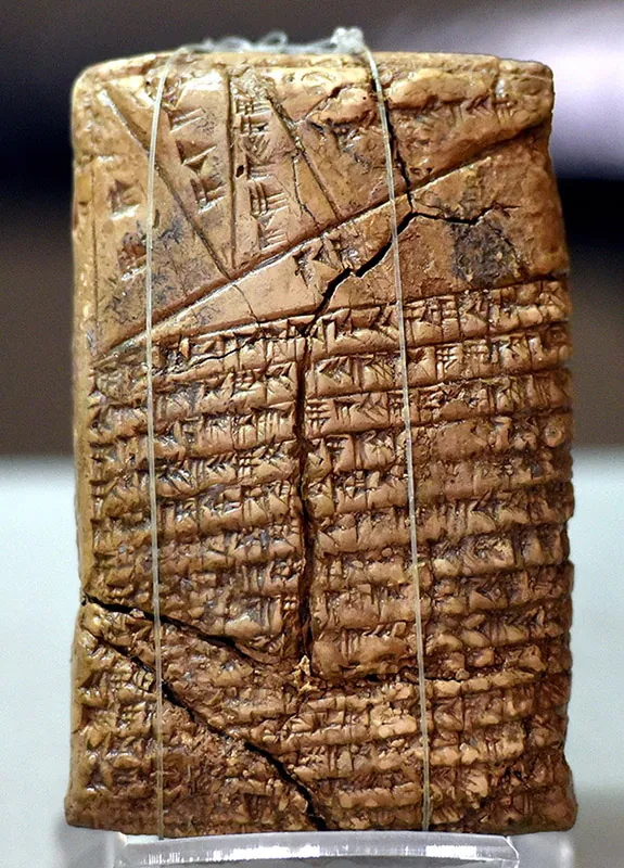 Babylonian numerals are written on a clay tablet.