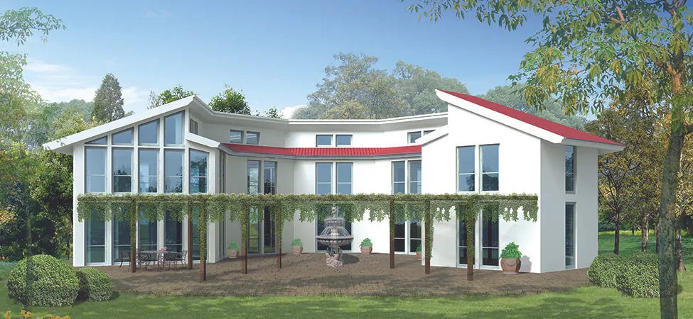 This is a photo of a two story home with several large windows.