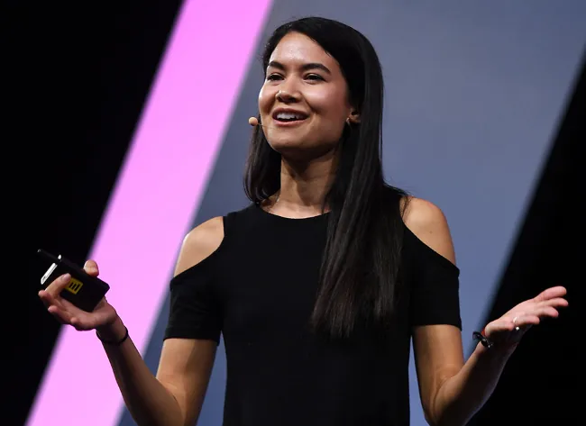 A photograph shows Melanie Perkins.