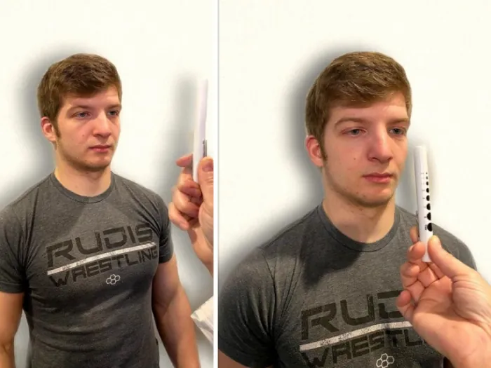 Photo showing simulated patient being assessed for eye convergence and accommodation