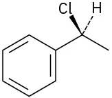 A carbon is single-bonded to wedge chlorine atom (front),  dash bonded to hydrogen atom (behind ), methyl (right), and phenyl (left).