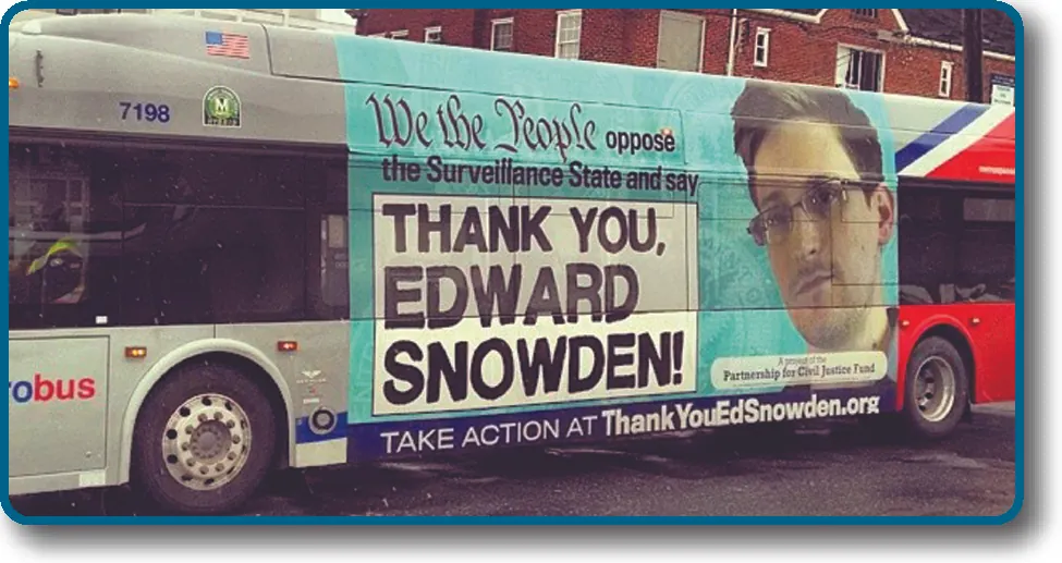 A photo of the side of a public bus. An advertisement on the side of the bus reads “We the People oppose the Surveillance State and say Thank you, Edward Snowden! Take action at ThankYouEdSnowden.org”.