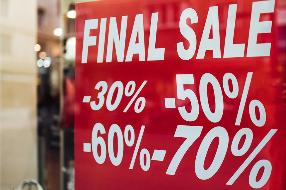 A sale board reads final sale 30 percent, 50 percent, 60 percent, and 70 percent.