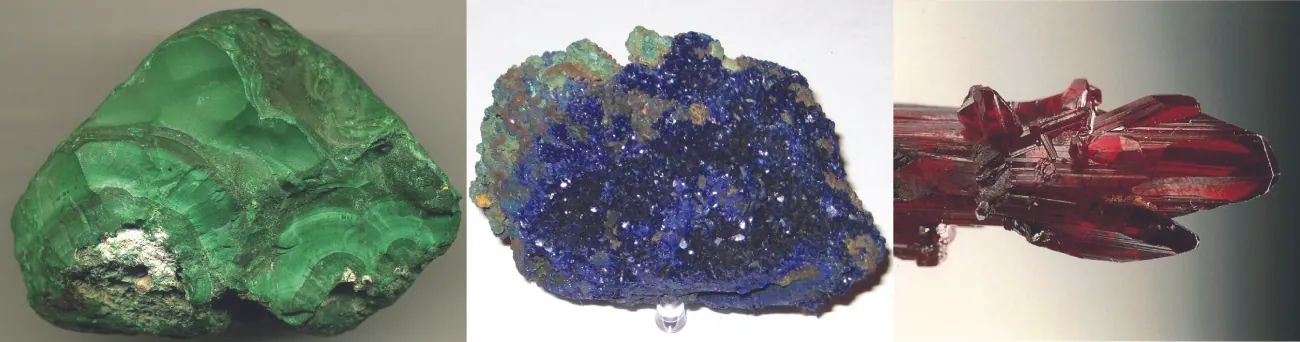 This figure contains three photos. The first is of a jade green mineral chunk with a darkened regions and a matte surface. The second is of a crystalline mineral chunk composed primarily of bright royal blue shiny crystals and some lighter blue crystalline regions. The third is of long red crystals.
