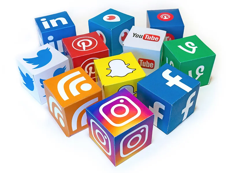 Logos for different social media companies are shown on cubes. Social media companies shown include Instagram, Blogger, Twitter, LinkedIn, Pinterest, Snap Chat, Facebook, and YouTube.