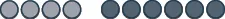 An abstract image featuring two rows of dark grey oval shapes, with three on the left and five on the right, against a stark white background.